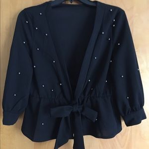 Blouse with embellishment.